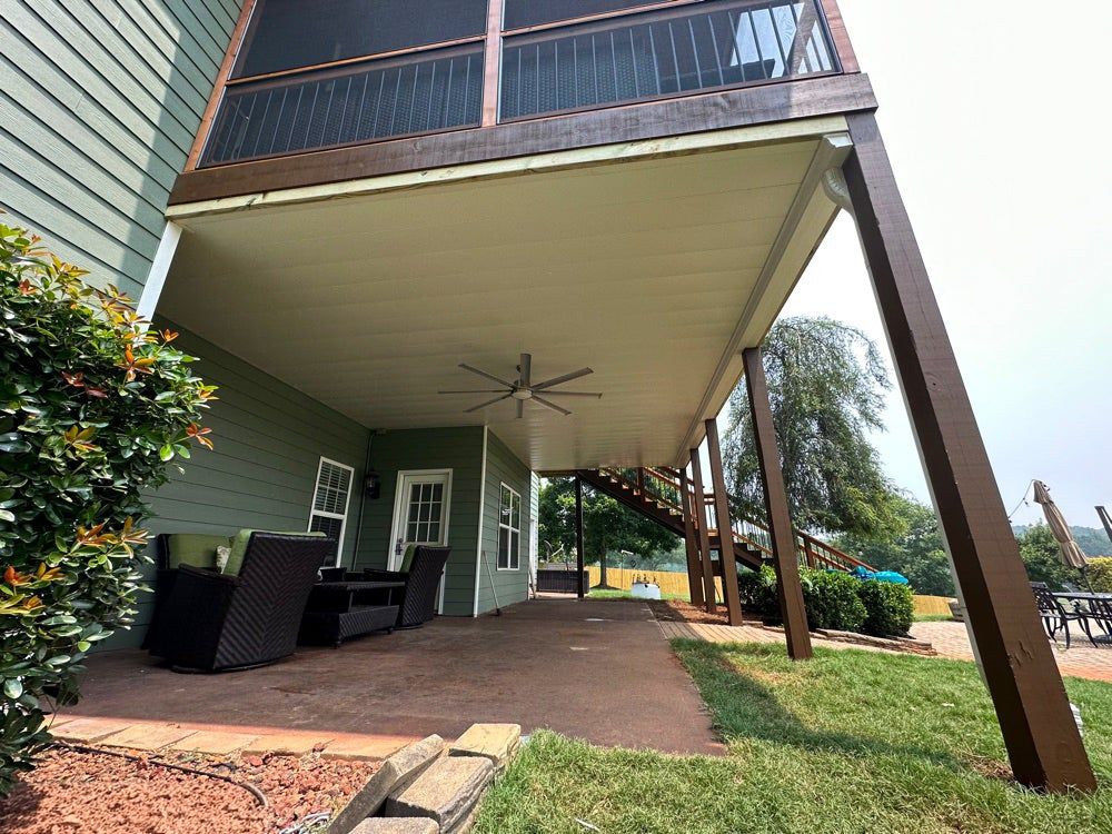 Dry patio under a finished deck ceiling